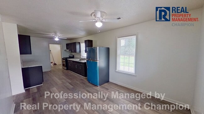 Photo - Freshly Updated 4 BD/1.5 BA with LVP Flooring, Fenced Back Yard and Storage Shed