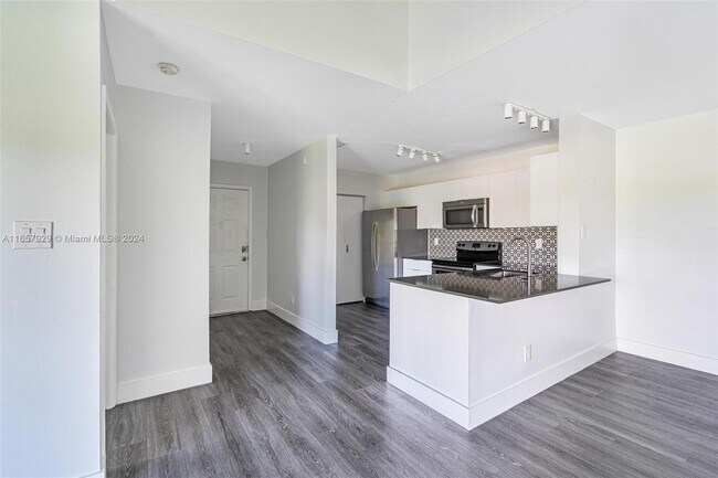 Photo - 11233 W Atlantic Blvd Unit #307 UPDATED