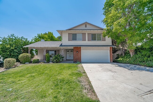Building Photo - Spacious 4-Bedroom Home with Sun Room & Vi...
