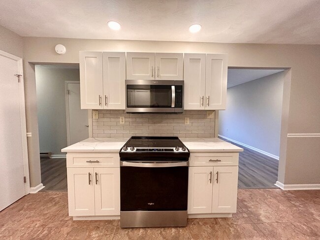 Photo - Spacious 4-Bedroom Home with Large Yard & Garage!