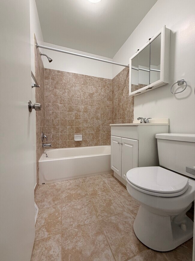 Updated Full Bathroom. Hot water included in rent!