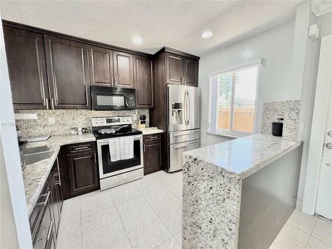 Photo - 10991 NW 30th Pl House