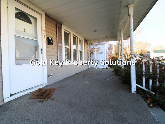 Photo - 2 BR 1 BA House with Fenced Backyard, Basement, and Garage NO SECTION 8