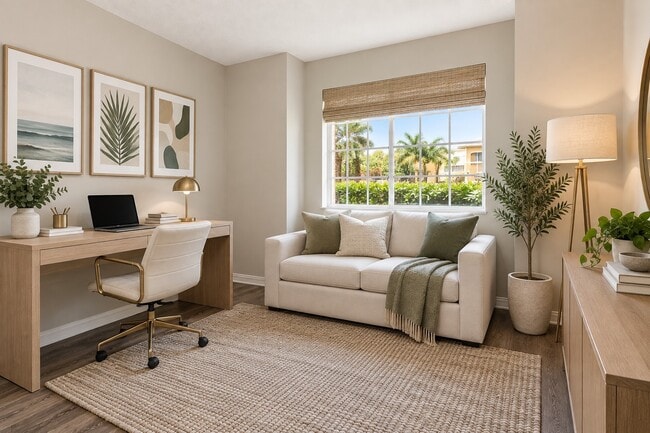 Elevate your lifestyle at Sanctuary Cove Apartments with this inviting living space designed for comfort and productivity. Natural light fills the room, highlighting modern features and cozy decor. Explore your new home today!