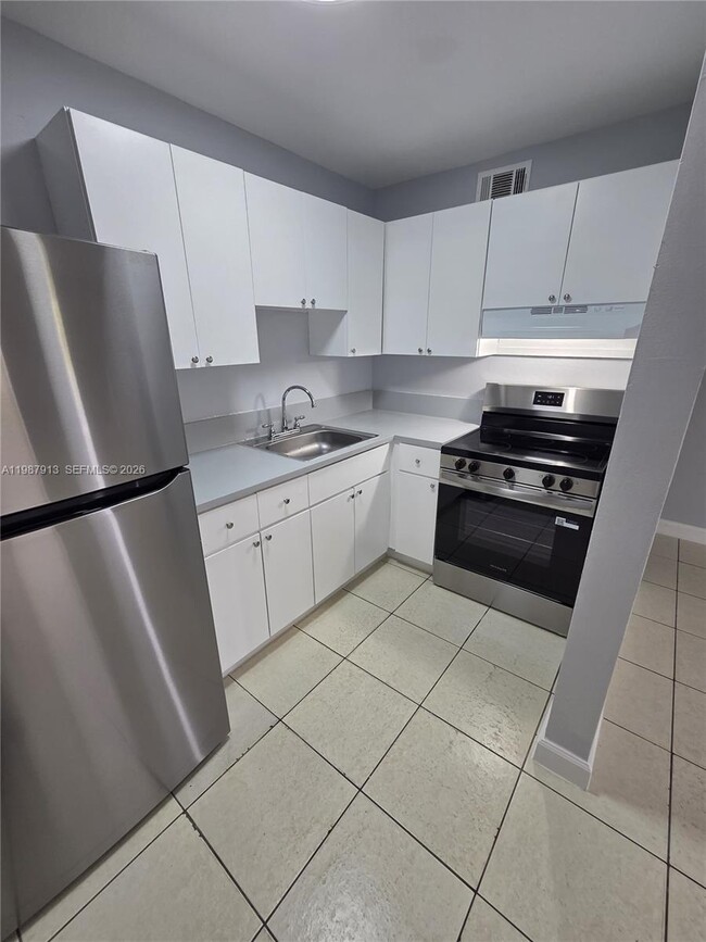 Building Photo - 11005 SW 1st St Unit 206