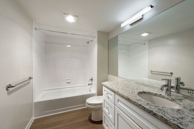 Renovated bathroom with granite countertops