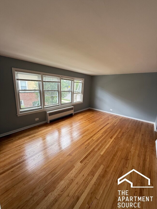 Building Photo - 6719 N California Ave Unit 1W Rental