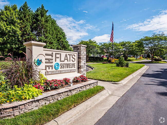 Monument Sign at Community Entrance. - The Flats at 55 Twelve Rental