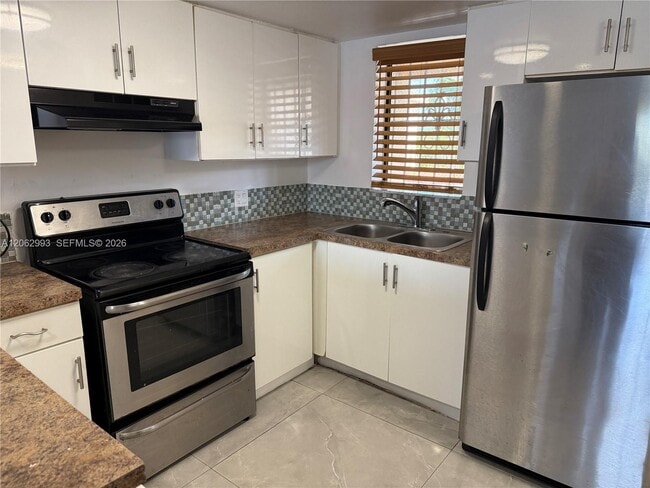 Building Photo - 5530 W 26th Ct Unit 210