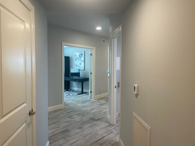Photo - Coastal Luxury at Hidden Bay | 3BR Waterfront Condo with Bay Views