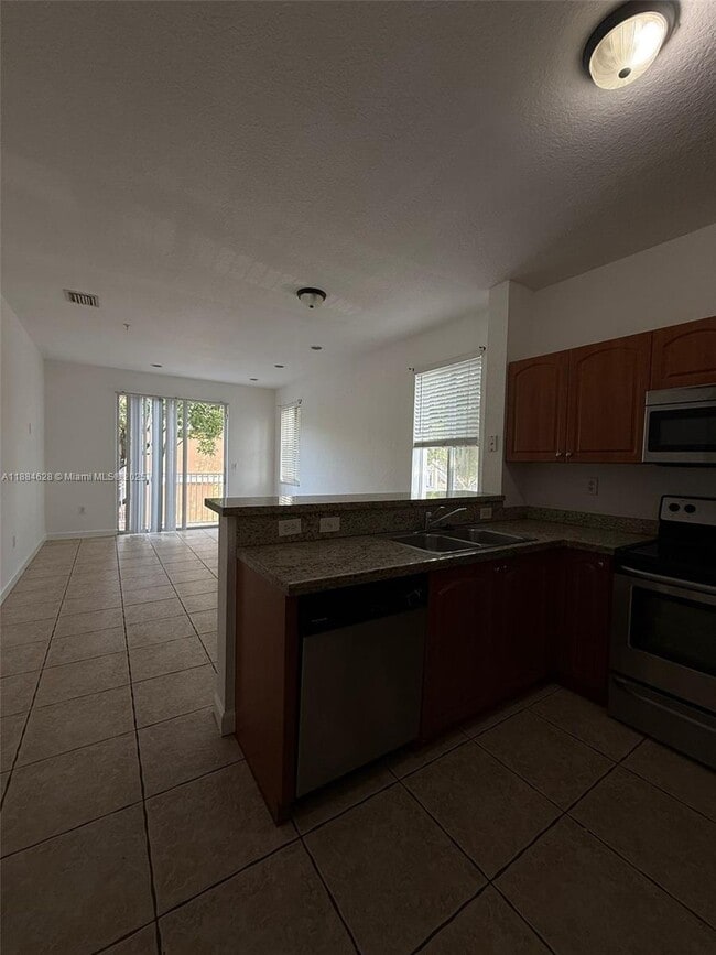 Photo - 17640 NW 73rd Ave Unit 200-19