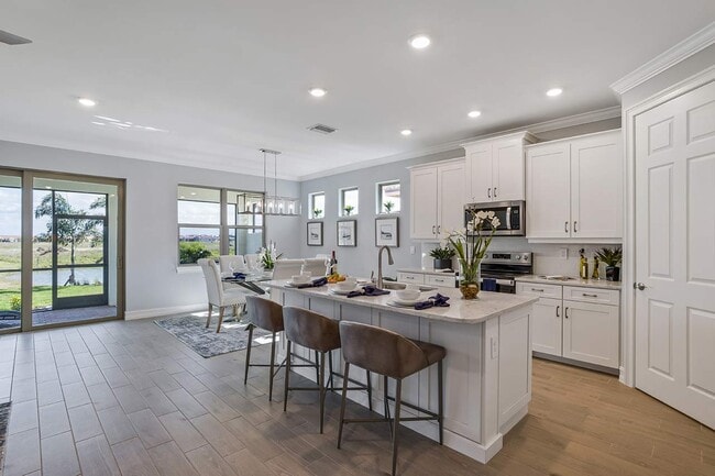 Cocina y comedor - 748 Ravello Blvd