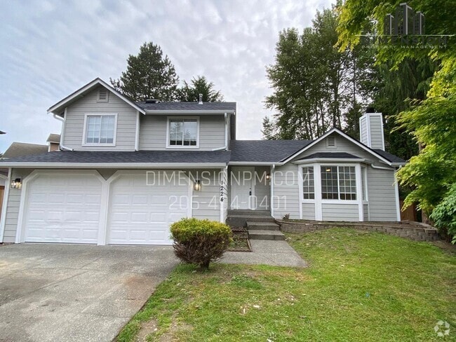 Building Photo - Stylishly Renovated Home with Private Back...