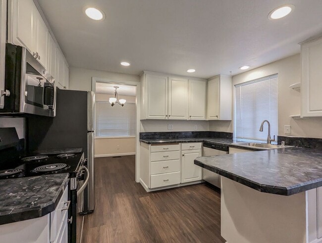 Photo - **Move-in Special!!!** Updated & move in ready 3 bed 2 bath rambler w/ 2 car garage!