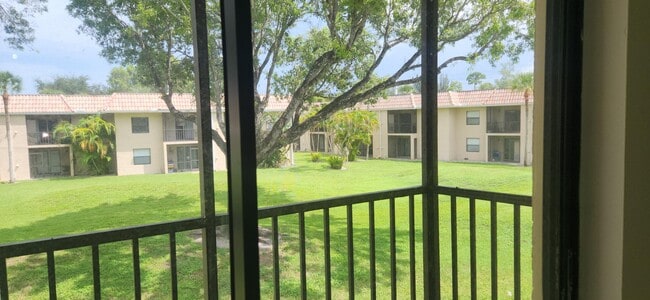 Building Photo - 6832 Palmetto Cir S Unit 204 Rental