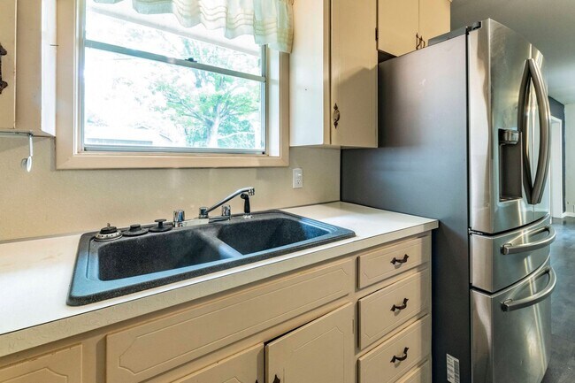 Photo - 4 Bed 3 Bath Brick Home with Fenced Yard