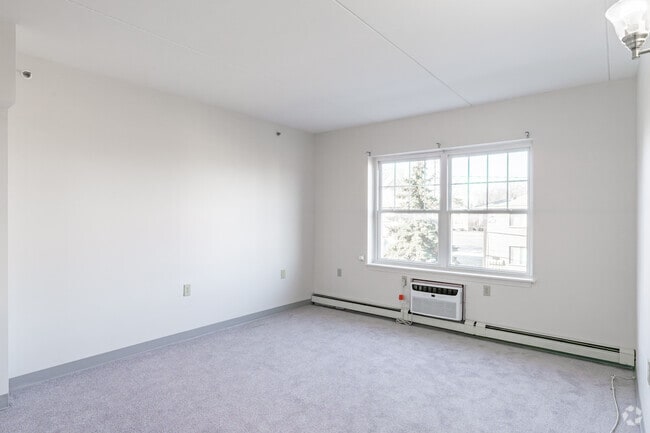 2BR, 1BA - 700SF - Living and Dining Area - Hartford Place Senior Apartments 55+