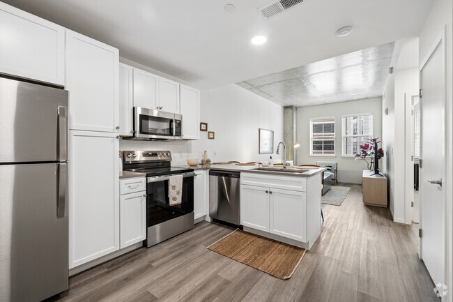 1BR, 1BA - 664SF - Kitchen and Living Room