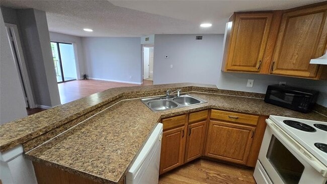 Building Photo - 9044 W Atlantic Blvd Unit 324