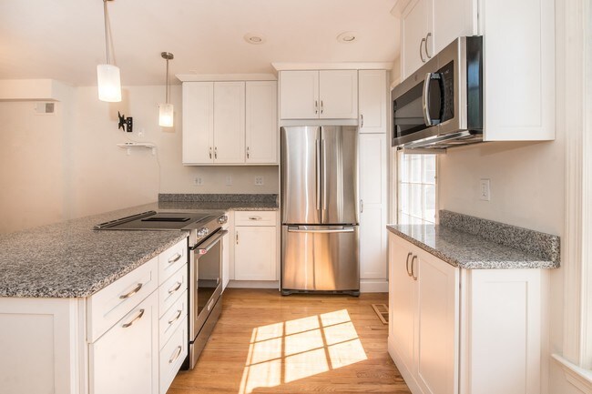 Photo - Available Now! Modern Row House in the Heart of Foggy Bottom with 1 Car Garage!