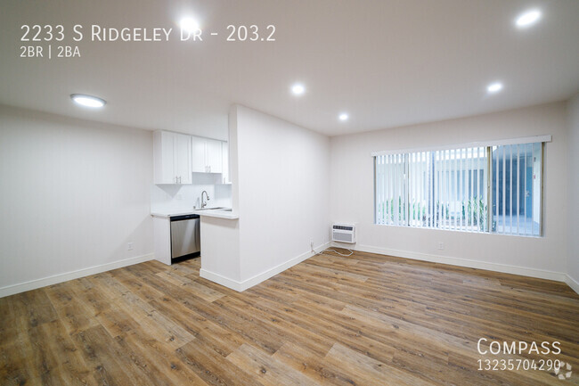 Building Photo - Shiny and NEW! Newly Reno'd 940 Sqft 2 Bed... Unit 203.2 Rental