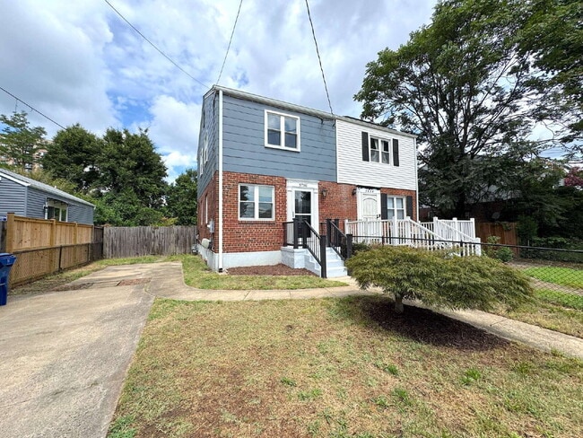 Building Photo - Charming 2BR Townhome with Finished Basement, Fenced Yard & Private Driveway Near Huntington Metro