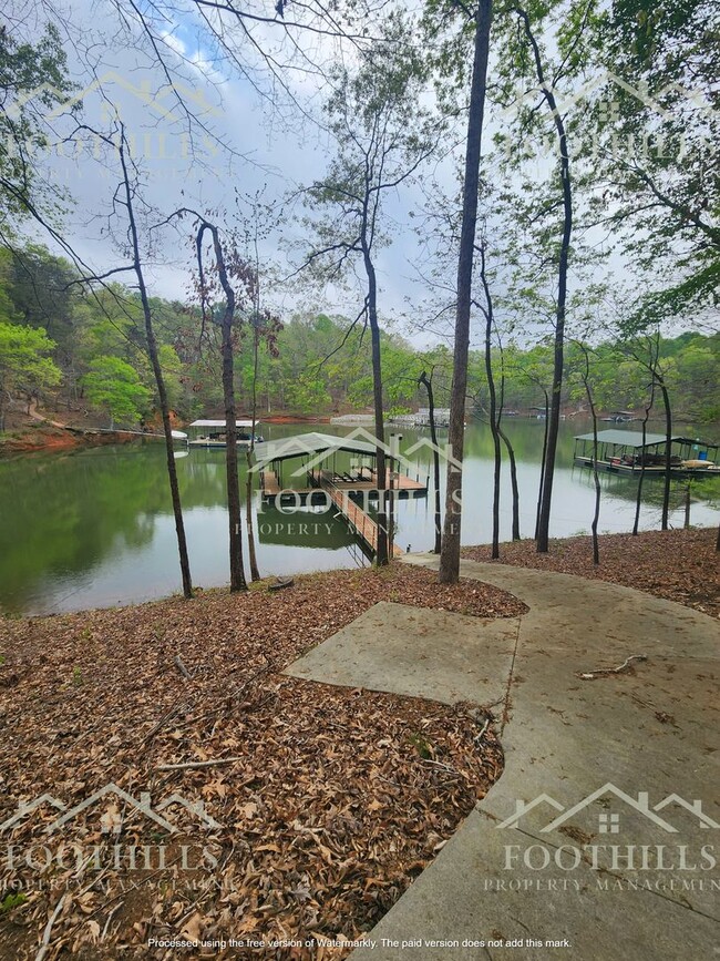 Photo - Lakefront Home with Covered 2-Slip Dock! &...