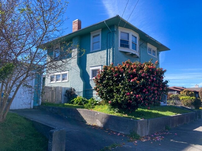 Photo - This pet-friendly colonial-style home features very large rooms!