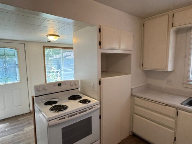 Photo - SINGLE FAMILY HOME WITH BONUS ROOM OFF THE DETACHED GARAGE- GARDNERS DREAM