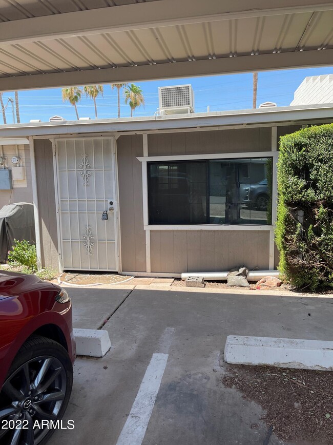Building Photo - 5233 E University Dr Unit H Rental