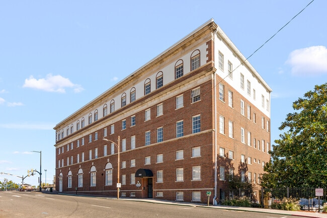 Building Photo - United Jewelers and Lee Hardware Apartments