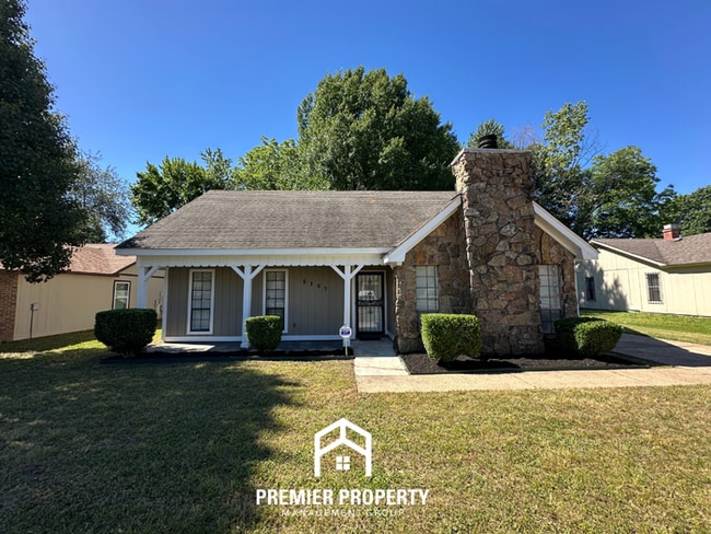 Building Photo - Beautiful 3BR/2BA Near Southwind | Soaring Vaulted Ceilings, Fireplace & Fenced Yard
