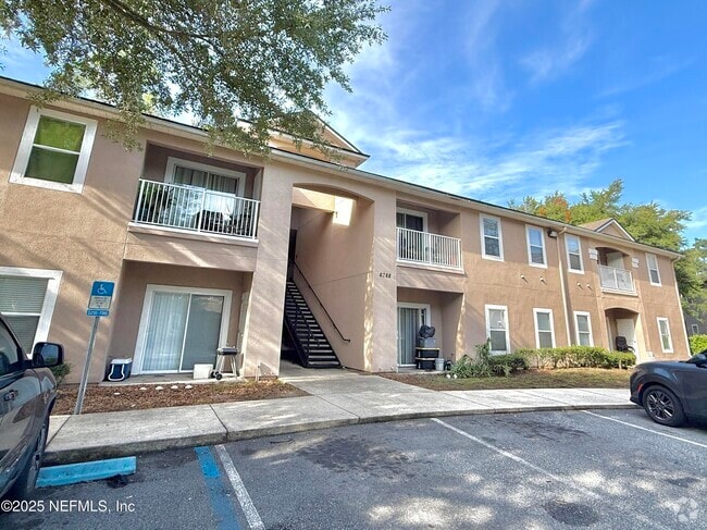 Building Photo - 6788 Manotak Oaks Dr Unit 207 Rental