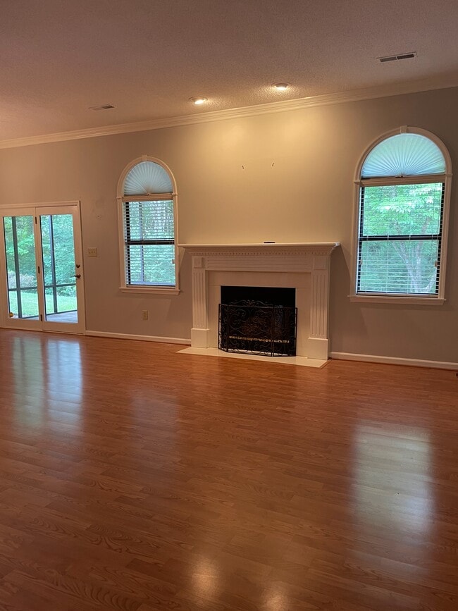 Living room with gas log fireplace - 135 Brandeis Ln