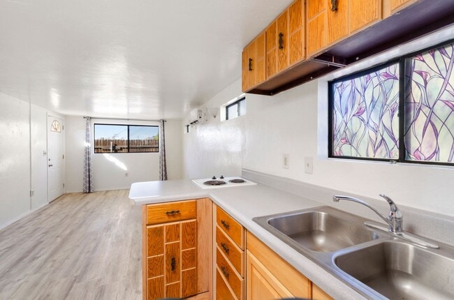 Building Photo - 1345 E Grant Rd Unit Studio