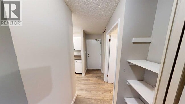 Photo - 10028-10105 105 Ave