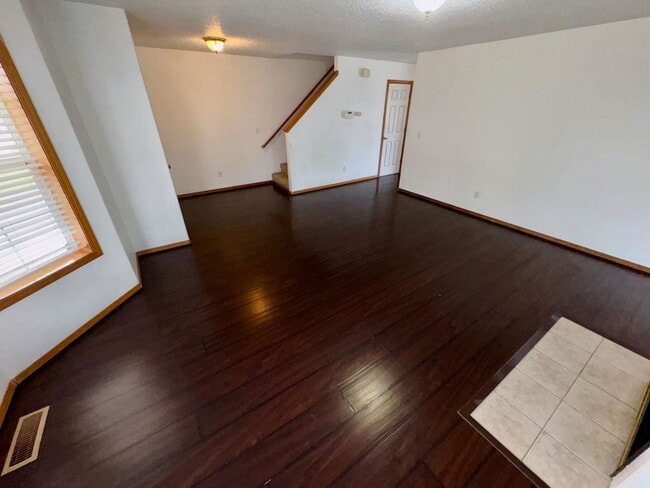 Photo - Spacious 4BR Home with Fenced Yard, 2-Car Garage & Convenient Location