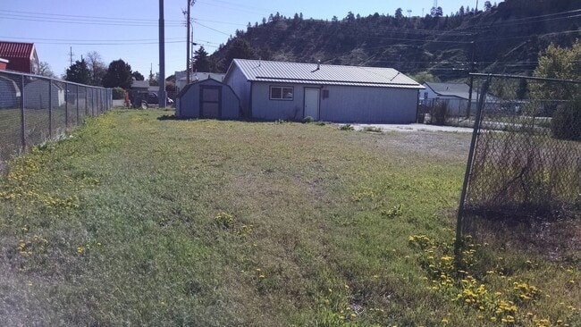 Photo - Small Living with Large Garage