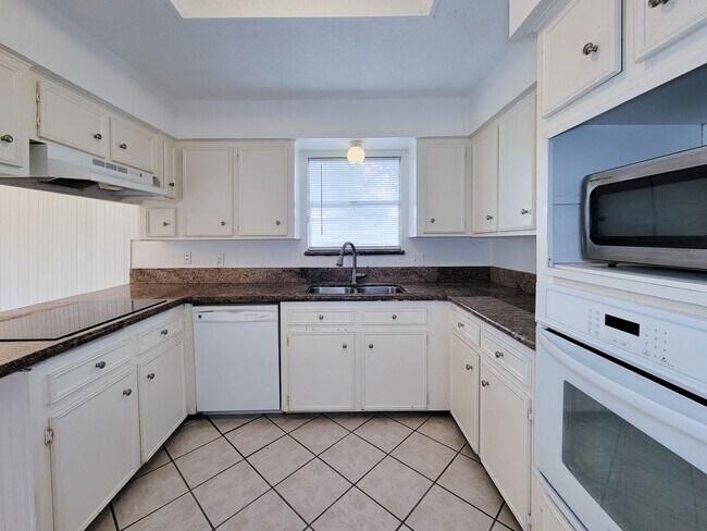 Photo - Come and view this open floor plan with much potential. Formal and dining room, granite counters,...