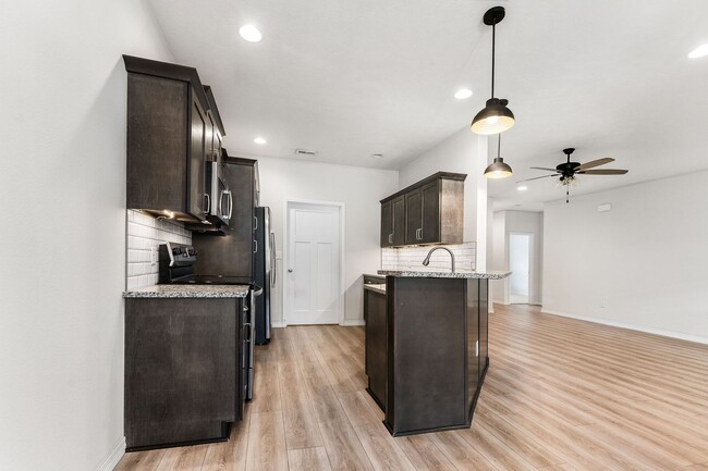 Photo - NEW LUXURY 3 BED 2 BATH 2 CAR GARAGE DUPLEX