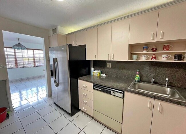 Building Photo - 6575 W 4th Ave Unit 311