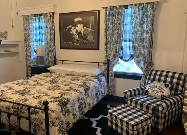 Bedroom with fireplace - 4514 NE 1st Ave Unit Design District Studio