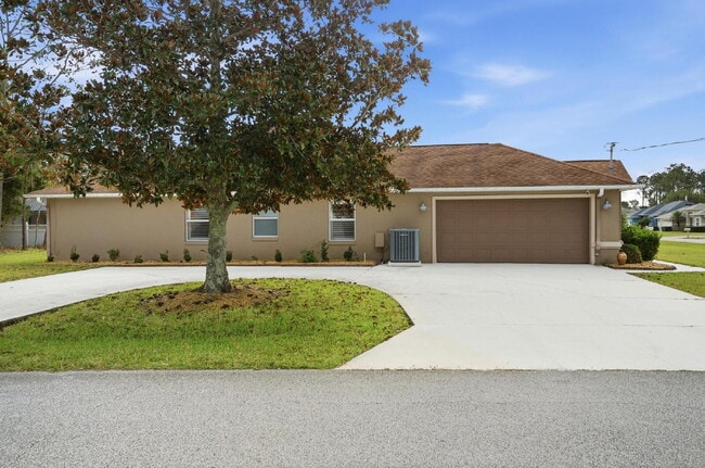 Photo - "Charming 3-Bedroom Home with 2 Full Baths and 2032 Sq Ft of Comfort in Palm Coast!"