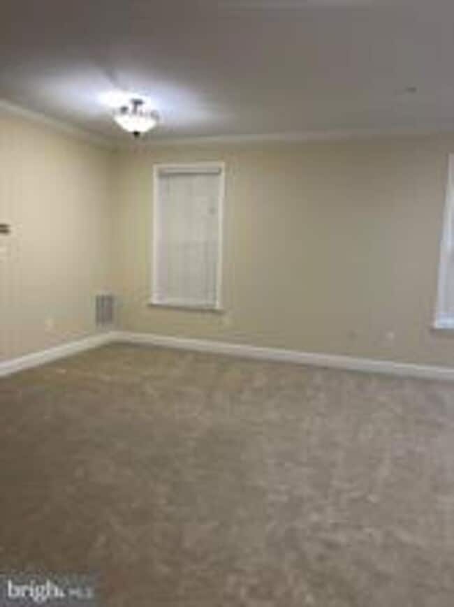 Photo - END UNIT TOWNHOUSE WITH 2 CAR GARAGE, 4 BEDROOMS AND 3.5 BATHS..FINISHED REC ROOM