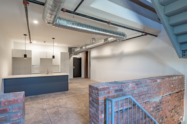 1BR, 1.5BA - 1,239SF - Kitchen and Living Area