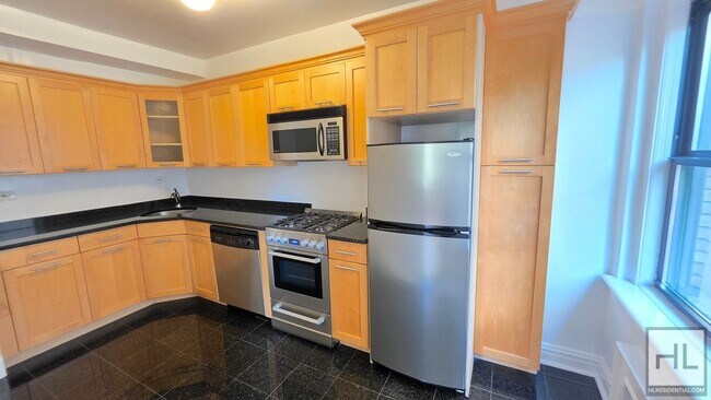 Oversized 3rd-Floor Studio with a Separate Windowed Kitchen in the West Village