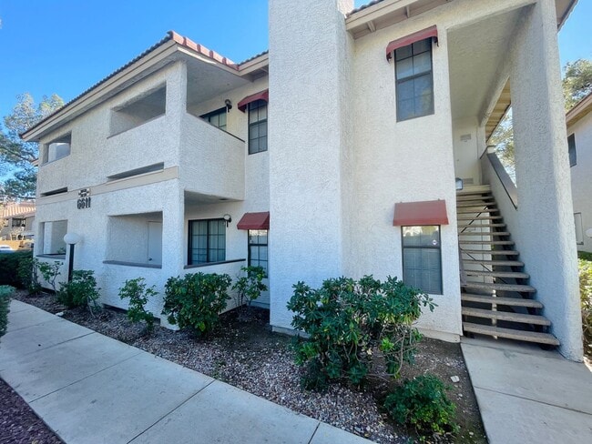 Building Photo - Centrally located beautiful second story condo in quiet community with tile & vinyl plank floorin...