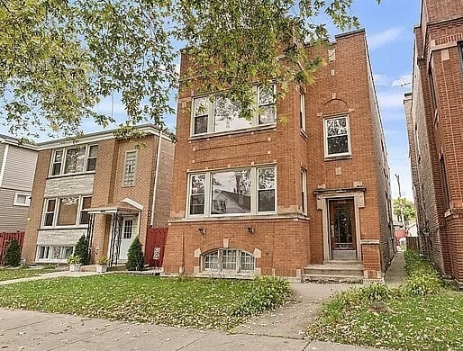 Building Photo - 5010 W Henderson St Unit 2
