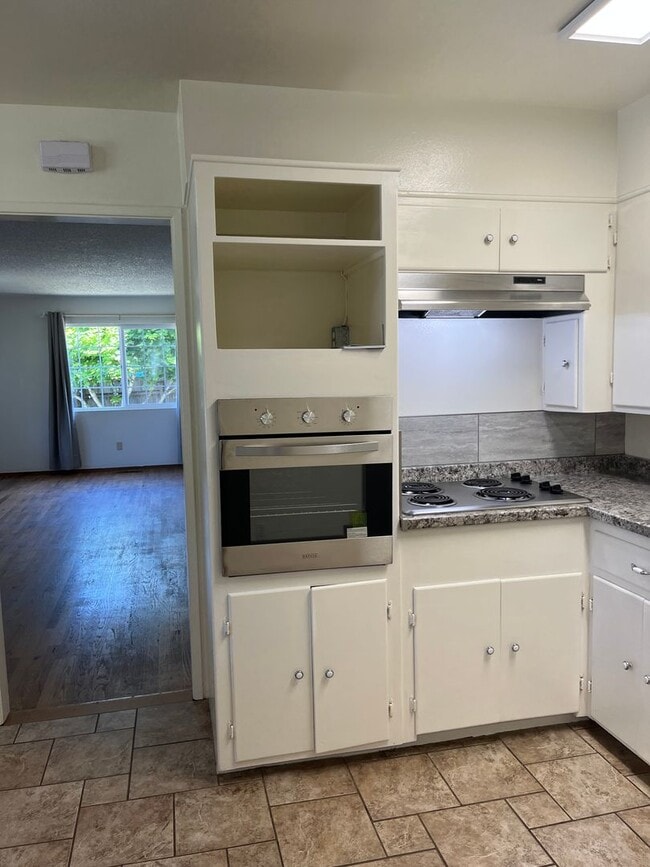 Photo - Sunny and Spacious 3/2 With Large Yard and Carport Parking!