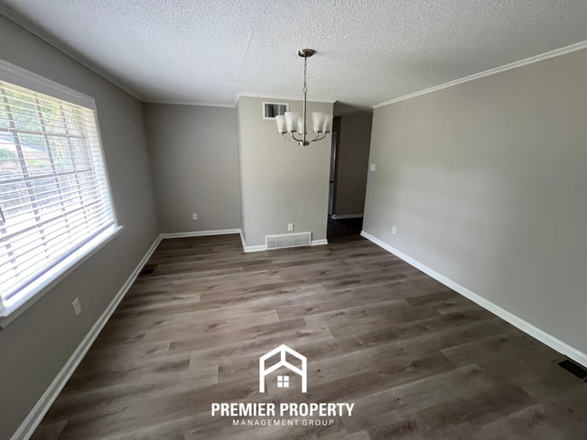 Photo - Spacious 4BR/2BA Home in 38118 | Hardwood Floors & Large Fenced Backyard